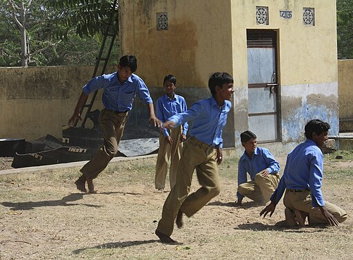 खो खो Kho kho game in progress at a government school in Haryana, India