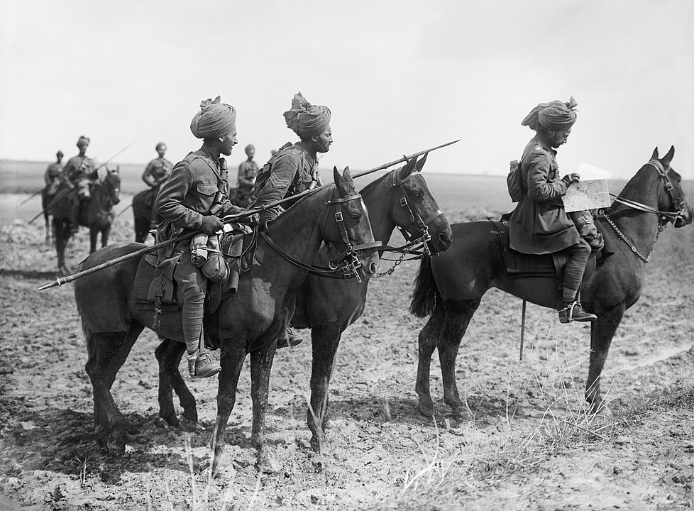 Indian Cavalry on the Western Front riding on horses with spears in hand - पहिले महायुद्ध